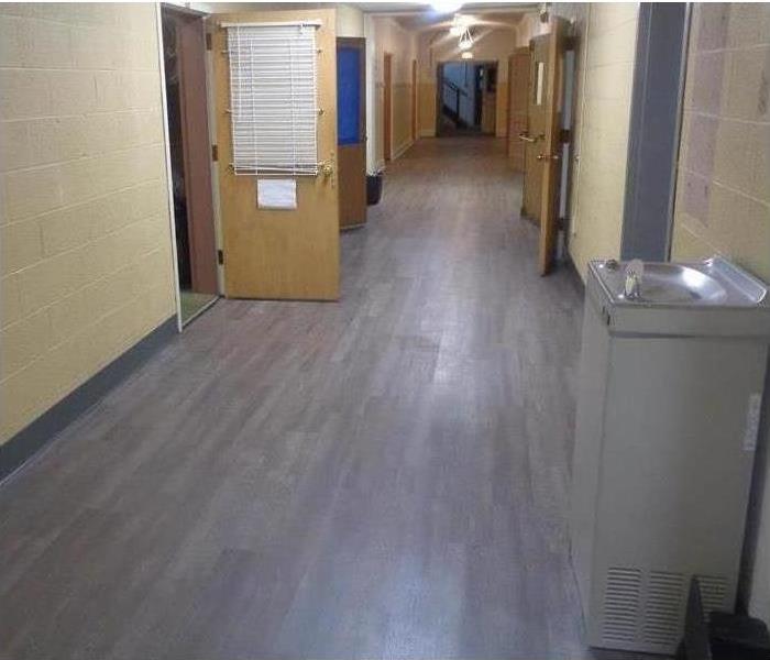 Toledo School hallway cleaned up and floor replaced
