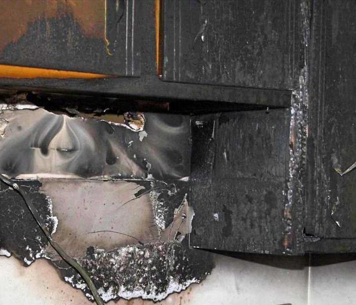 Cabinets damaged by fire.